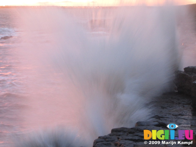 SX04330 Waves splashing at sunset